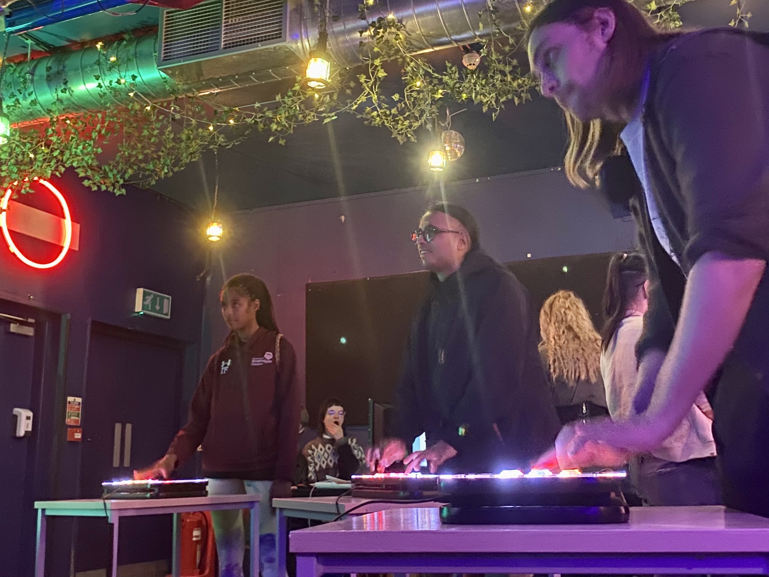 Three people playing Bar Fight